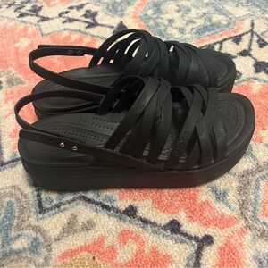 Strappy style black platform crocs sandals
